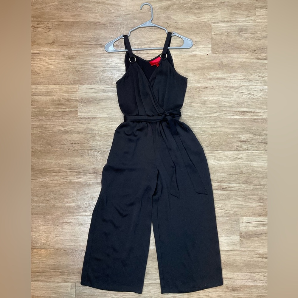 Black tank jumpsuit- Jennifer Lopez